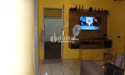 Casa residencial disponível para venda no bairro Cazeca em Uberlândia-MG