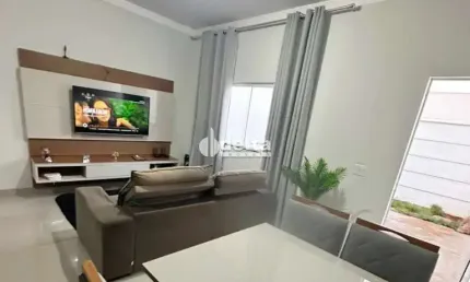 Casa geminada disponível para locação e venda no bairro Jardim Holanda em Uberlândia MG