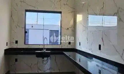 Casa residencial disponível para venda no bairro Jardim Brasília em Uberlândia-MG