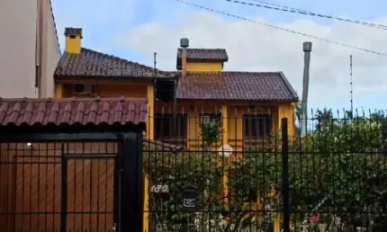 Casa com 3 quartos à venda na Rua Lola de Oliveira, Parque Santa Fé, Porto Alegre