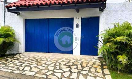 Imponente casa em condomínio de alto padrão em Vargem Grande, Rio de Janeiro - 4 quartos, 3 suítes, 2 salas, 6 banheiros, 3 vagas, 600m².