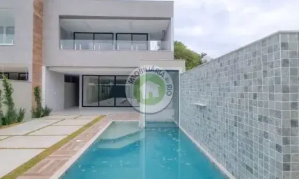 Casa triplex de 360m², 4 suítes no condomínio interlagos de itaúna - barra da tijuca