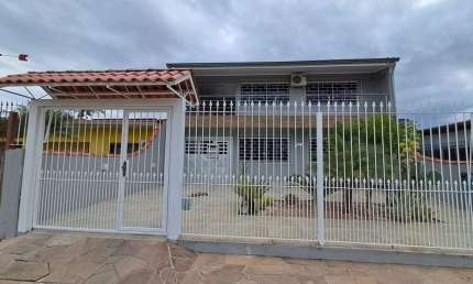 Casa com 3 quartos à venda na Rua Gaspar Martins, 894, Americana, Alvorada