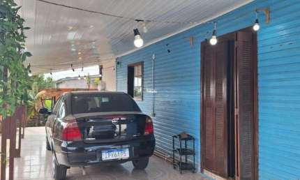 LINDA CASA NA GAÚCHA, 3 DORMITÓRIOS, 4 VAGAS DE GARAGEM, ENERGIA SOLAR, ACEITA FINANCIAMENTO.