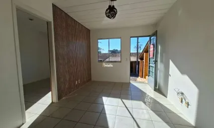 Linda Casa à Venda no Condomínio Village Tarumã – 2 Dormitórios, Espaço Gourmet e Muito Conforto!