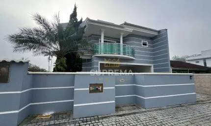 Casa com 4 dormitórios à venda, 300 m² por R$ 1.200.000,00 - Iririú - Joinville/SC