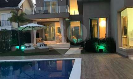 Casa em condomínio fechado com 5 quartos à venda na Alameda Carinás, 128, Alphaville, Santana de Parnaíba, 760 m2 por R$ 5.900.000