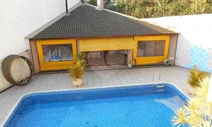 Casa em condomínio fechado com 4 quartos à venda na Rua Bartolomeu Bueno da Silva, 1, São Paulo II, Cotia, 435 m2 por R$ 2.400.000