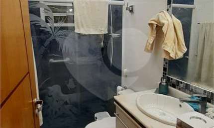 Casa com 4 quartos à venda na Rua Alberto Baccarat, 55, Boqueirão, Santos, 148 m2 por R$ 1.240.000