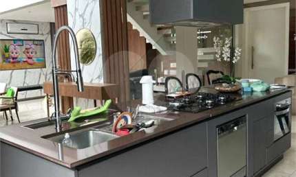 Casa em condomínio fechado com 4 quartos para alugar na Alameda Michelangelo, 1037, Alphaville, Santana de Parnaíba, 390 m2 por R$ 24.400