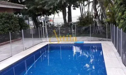 Casa térrea, frente praia Enseada, 4 suítes, 3 vagas