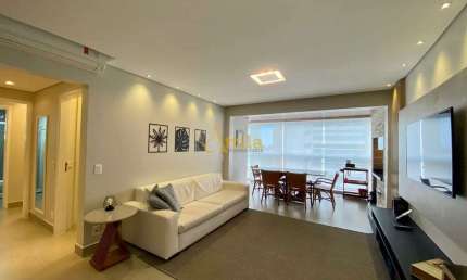 Apto alto padrão com 3 dorms., e vista parcial para o mar