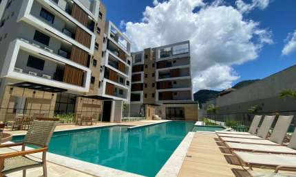 Ubatuba - Enseada. Apartamentos alto padrão pé na areia na praia da Enseada