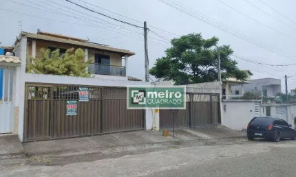 Casa com 3 dormitórios à venda, 126 m² por R$ 380.000,00 - Maria Turri - Rio das Ostras/RJ