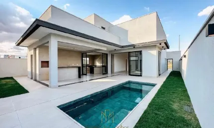 Casa em Condomínio de Luxo na Morada da Colina, Uberlândia-MG: 3 quartos, 1 suíte, 1 sala e 4 vagas de garagem!