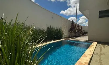 Casa em condomínio fechado com 3 quartos à venda no Grand Ville, Uberlândia  por R$ 1.300.000