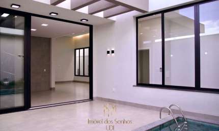 Condomínio Reserva dos Ipês: Luxo e conforto em Uberlândia-MG! Casa com 3 quartos, 3 suítes e 194,88m² no Novo Mundo.