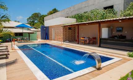 Casa em condomínio fechado com 4 quartos à venda na Rua A, 789, Barra do Jacuípe, Camaçari
