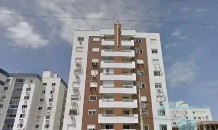 Apartamento com 02 dormitórios, com suite e garagem.