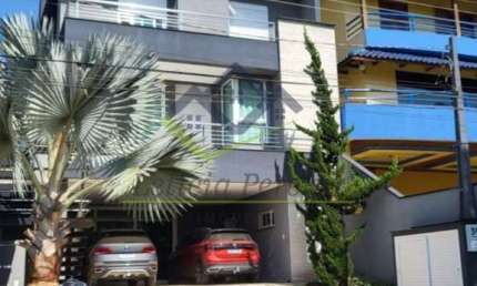 Sobrado com 3 dormitórios à venda, 420 m² por R$ 4.185.000,00 - Aruã - Mogi das Cruzes/SP