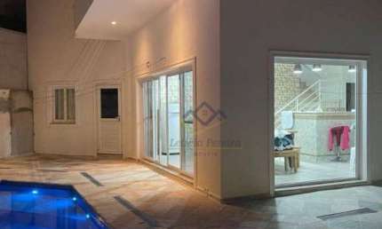 Sobrado com 3 dormitórios à venda, 300 m² por R$ 2.850.000,00 - Aruã Ecopark Lagos - Mogi das Cruzes/SP