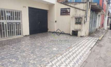 Casa com 3 dormitórios para alugar, 104 m² por R$ 6.230,00/mês - Centro - Suzano/SP