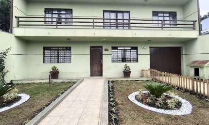 Casa com 5 quartos para alugar na Rua Guilherme Wisniewski, 438, Santa Cândida, Curitiba, 256 m2 por R$ 4.995