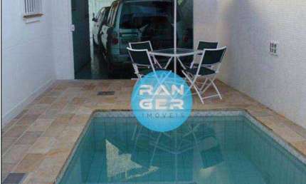 Casa com 4 dormitórios e piscina à venda na Ponta da Praia - Santos/SP