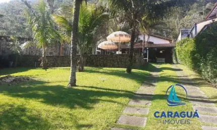 Sobrado com uma belíssima e ampla área de lazer com piscina à venda no Bairro do Cidade Jardim, em Caraguatatuba