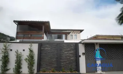 Belíssima casa com 3 dormitórios no Jardim Califórnia - Caraguatatuba