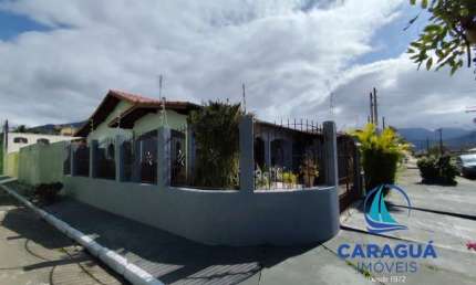Casa de esquina, 3 dormitórios e 2 suítes no Indaiá, Caraguatatuba - SP