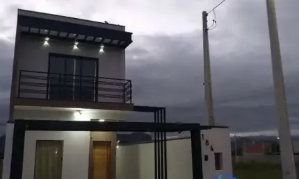 Casa 2 dormitórios, 1 suíte, piscina e churrasqueira, em loteamento com segurança 24h, Jaraguá, Caraguatatuba - SP