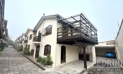 Casa em condomínio fechado com 3 quartos à venda na Tristeza, Porto Alegre  por R$ 650.000
