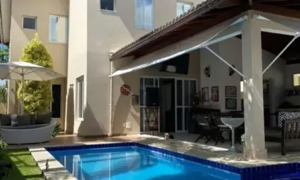 Alphaville I,4 suítes, piscina privativa e gabinete.