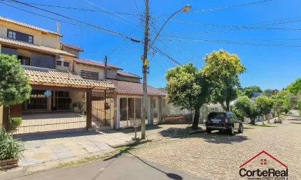 Casa com 3 quartos à venda na Rua Doutor Egydio Michaelsen, 62, Cavalhada, Porto Alegre por R$ 680.000