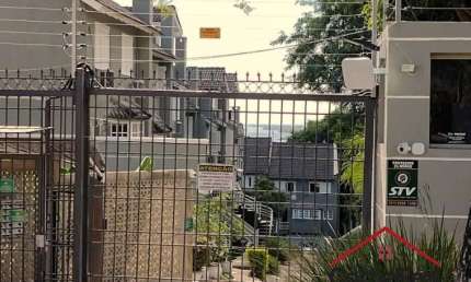 Casa em condomínio fechado com 3 quartos à venda na Rua Corrêa Lima, 1401, Santa Tereza, Porto Alegre por R$ 1.040.000
