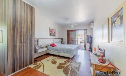 Casa com 3 quartos à venda na Rua Padre Alois Kades S J, 310, Jardim Europa, Porto Alegre por R$ 1.360.000