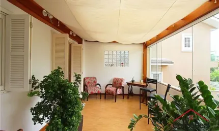 Casa com 3 quartos à venda na Rua Felizardo de Farias, 185, Medianeira, Porto Alegre por R$ 615.000