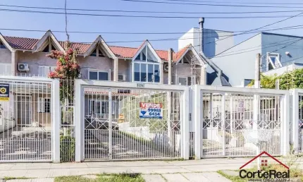Casa com 2 quartos à venda na Rua Heitor Kramer, 324, Guarujá, Porto Alegre por R$ 430.000