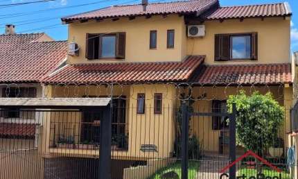 Casa com 3 quartos à venda na Rua Doutor Mário Totta, 2812, Tristeza, Porto Alegre por R$ 870.000
