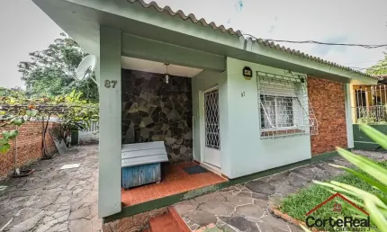 Casa com 3 quartos à venda na acesso das tulipas, 87, santa tereza, porto alegre por r$ 383.000