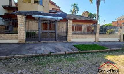 Casa com 4 quartos à venda na Rua Paissandu, 361, Partenon, Porto Alegre por R$ 2.900.000