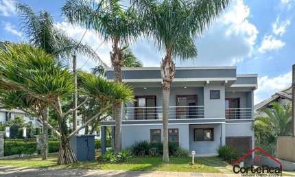 Casa com 4 quartos à venda na Rua Tocantins, 937, Lomba do Pinheiro, Porto Alegre por R$ 1.389.000
