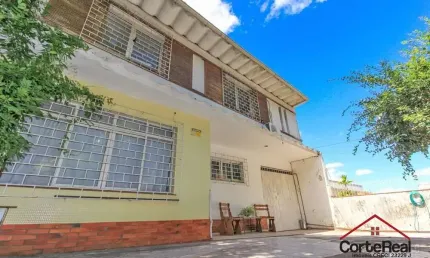 Casa com 5 quartos à venda na Rua João Bastian, 24, Três Figueiras, Porto Alegre por R$ 1.280.000
