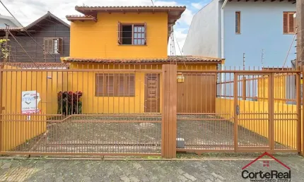 Casa com 3 quartos à venda na Rua Giobatta Giuseppe Petracco, 220, Vila Nova, Porto Alegre por R$ 475.000