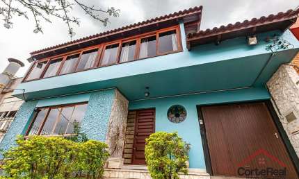 Casa com 5 quartos à venda na Avenida Engenheiro José Maria de Carvalho, 94, Vila Ipiranga, Porto Alegre por R$ 1.190.000