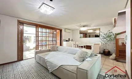 Casa com 3 quartos à venda na avenida coronel marcos, 2171, pedra redonda, porto alegre por r$ 670.000