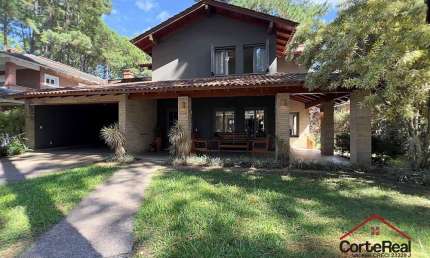Casa em condomínio fechado com 4 quartos à venda na central, 1500, Atlântida, Xangri-Lá por R$ 1.900.000