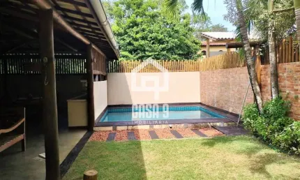 Casa com 7 suítes e terreno privativo de 1360 m² a venda em condomínio fechado 2 Km de Praia do Forte Bahia