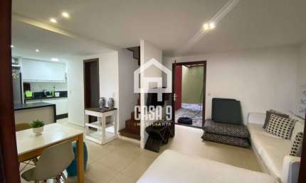 Apartamento térreo duplex vista mar pé na areia com 3 quartos a venda em Itacimirim Bahia